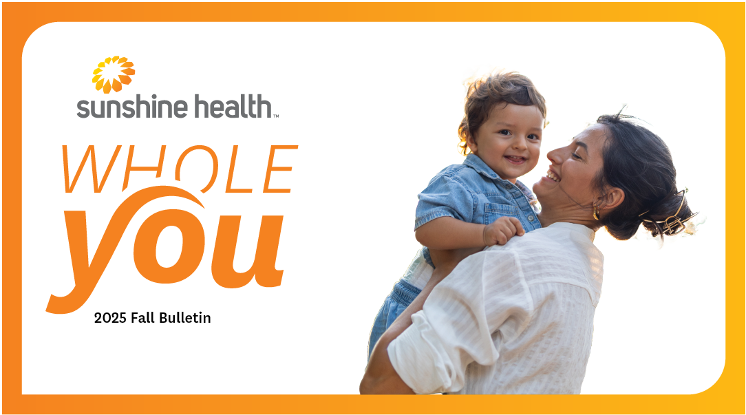Woman holding young boy. Sunshine Health Whole You Fall 2025 Bulletin
